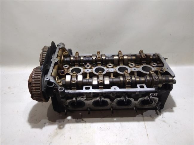 Статья «Ремонт головки блока цилиндров» из раздела «Силовой агрегат — Ремонт двигателя 1,5 л SOHC» инструкции по ремонту автомобиля Chevrolet Aveo 2003-2008 годов выпуска.
